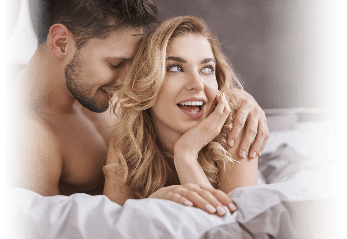 guy embracing girl on bed